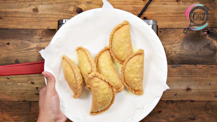 Fried Mawa Gujiya on plate.